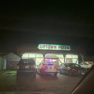 cars parked in front of the store