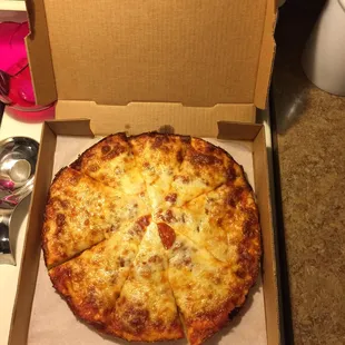 You can never go wrong with an uptown pizza! Super cheesy!