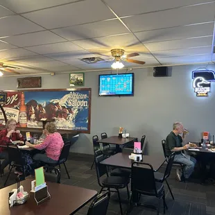 diners sitting at tables in a restaurant