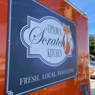 the logo on the side of the truck