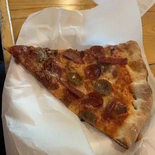 Pepperoni and sausage slice