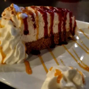 Cheesecake maiden house with raspberry sauce  This is a 1/2 serving