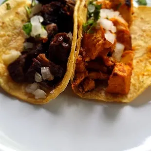 Steak and chicken tinga tacos