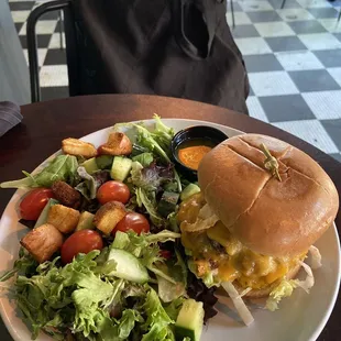 Cheeseburger and salad side