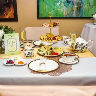 Enjoy an assortment of finger sandwiches, quiches, scones, desserts, lemon curd, Devonshire cream, and jam accompanied by your choice of tea