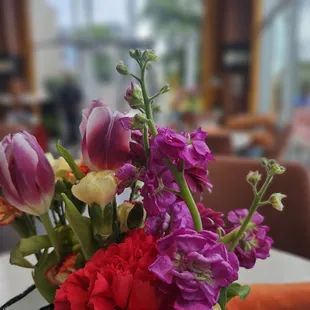 Floral arrangements on each table