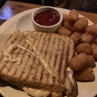 Fig jam grilled cheese panini with Tater tots!