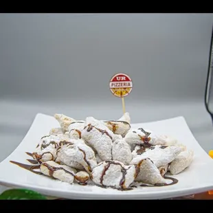 Zeppolis with chocolate drizzle