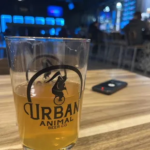 a glass of beer on a table