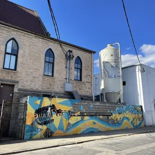 a building with a mural on the side of it