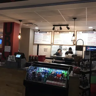 ows two people at a counter