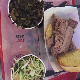 Brisket smokehouse plate with collard greens and super food slaw