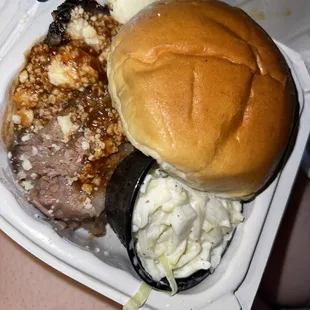 ows a sandwich and coleslaw