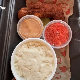 Kids meal with Mac and cheese Came with signature bird sauce and hot Cheeto dust