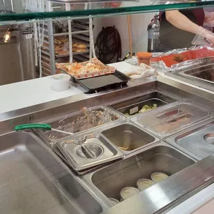 You can see the workers prepare the food right in front of you.