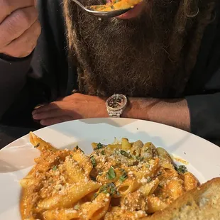 HE ENJOYED Rigatoni Bolognese Pasta