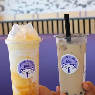 Mango yogurt, black milk tea with boba