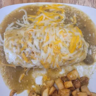 a burrito and potatoes