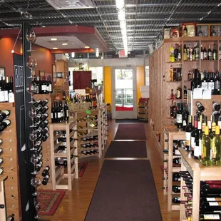 rows of wine bottles on shelves