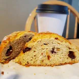 Cross section of the cherry almond scone and 8 oz latte