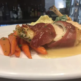 Fontina and herb stuffed pork chop.