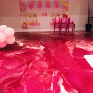 That looks like a little party area and I love the pink floors