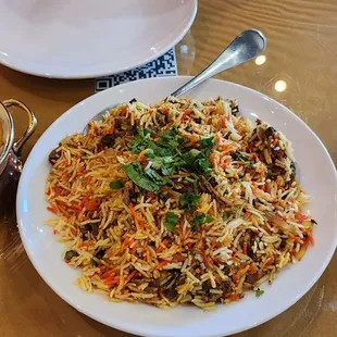 Goat biryani and chicken Tika marsala (yummy) with yogurt sauce