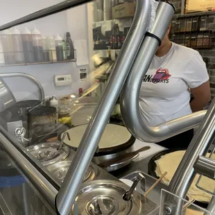 Owner making fresh crepes