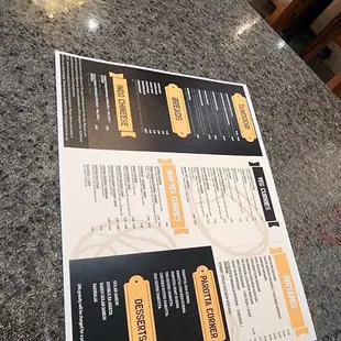 a restaurant menu on a table