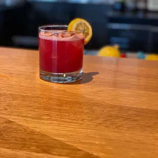 Blackberry Sour:  house blackberry and roasted Rosemary reduction, squeezed lemon, Aquafaba, with gin