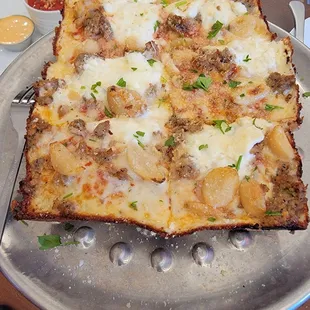 The square sausage pizza