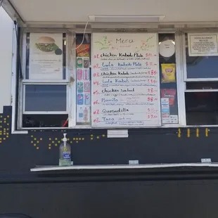 a food truck with menus