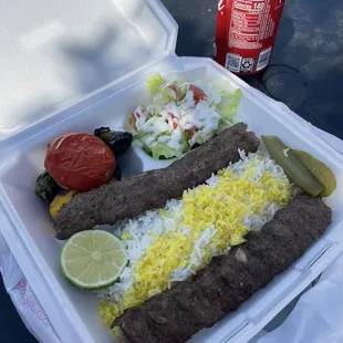 a can of soda and salad