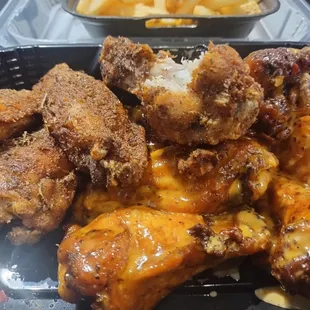 The wings! Half jerk spices, half slap your mama sauce