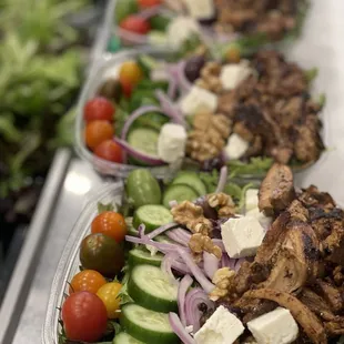a long line of salads