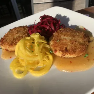 Blue crab cakes, pickled spicy beets, mango chutney