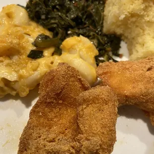 Crispy moist Catfish, fantastic greens, and the cheesiest macncheese EVER oh and half eaten cornbread
