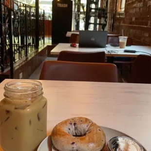 Blueberry bagel w/ cream cheese.  Iced hazelnut cold brew coffee.