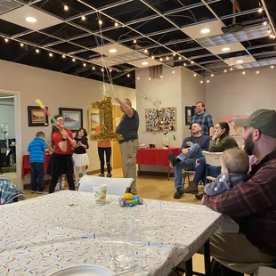 a group of people gathered around a table