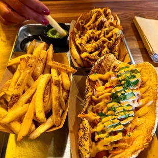 Top is the onion crunch dog with a brat and the bottom is the bahn mi dog, all beef frank, with siracha mayo.