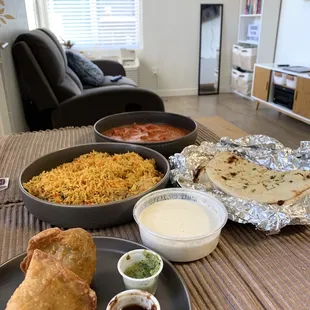 Vegetable Samosa, Catering Chicken Biryani, Garlic Naan Bread, @Butter Chicken