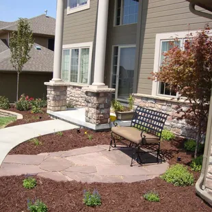 Creating a functional space out of an otherwise awkward area can be done with small patio's or waterfeatures...