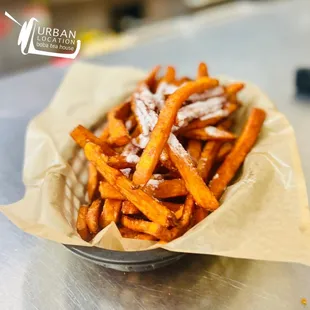 a basket of sweet potato fries