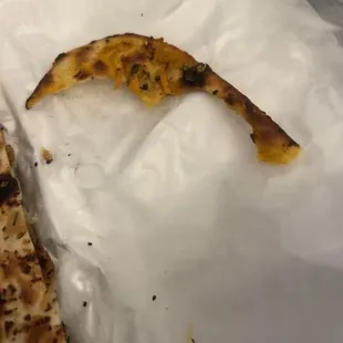 I hope the human garbage can who took a bite out of our garlic naan choked on it.