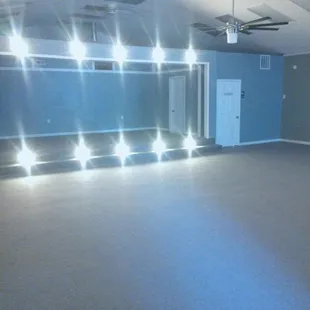 Suite B has a stage and DJ booth. Hosts up to 65 guests currently.