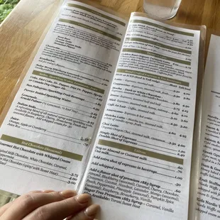 a person reading a menu