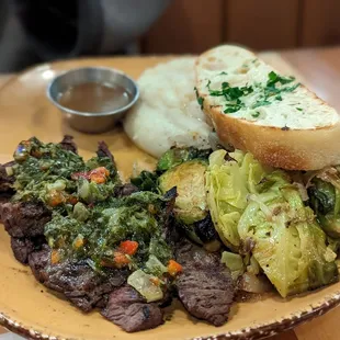Steak with mashed potatoes and brussel sprouts