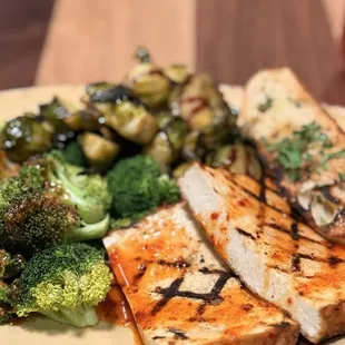 Chili Glazed Grilled Tofu Bowl  - tofu texture was good   - broccoli (meh too gingery) - brussel sprouts were good tho