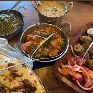 Lamb seekh kebab, chicken karahi, saag and choice of Nan or roti