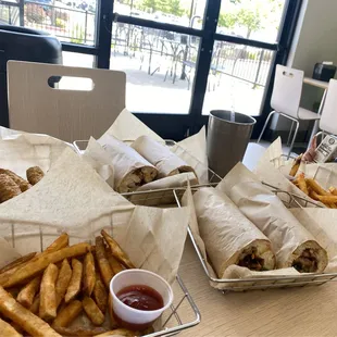 Grilled chicken banh mi, crispy pork banh mi with fries &amp; soda and mozzarella sticks.